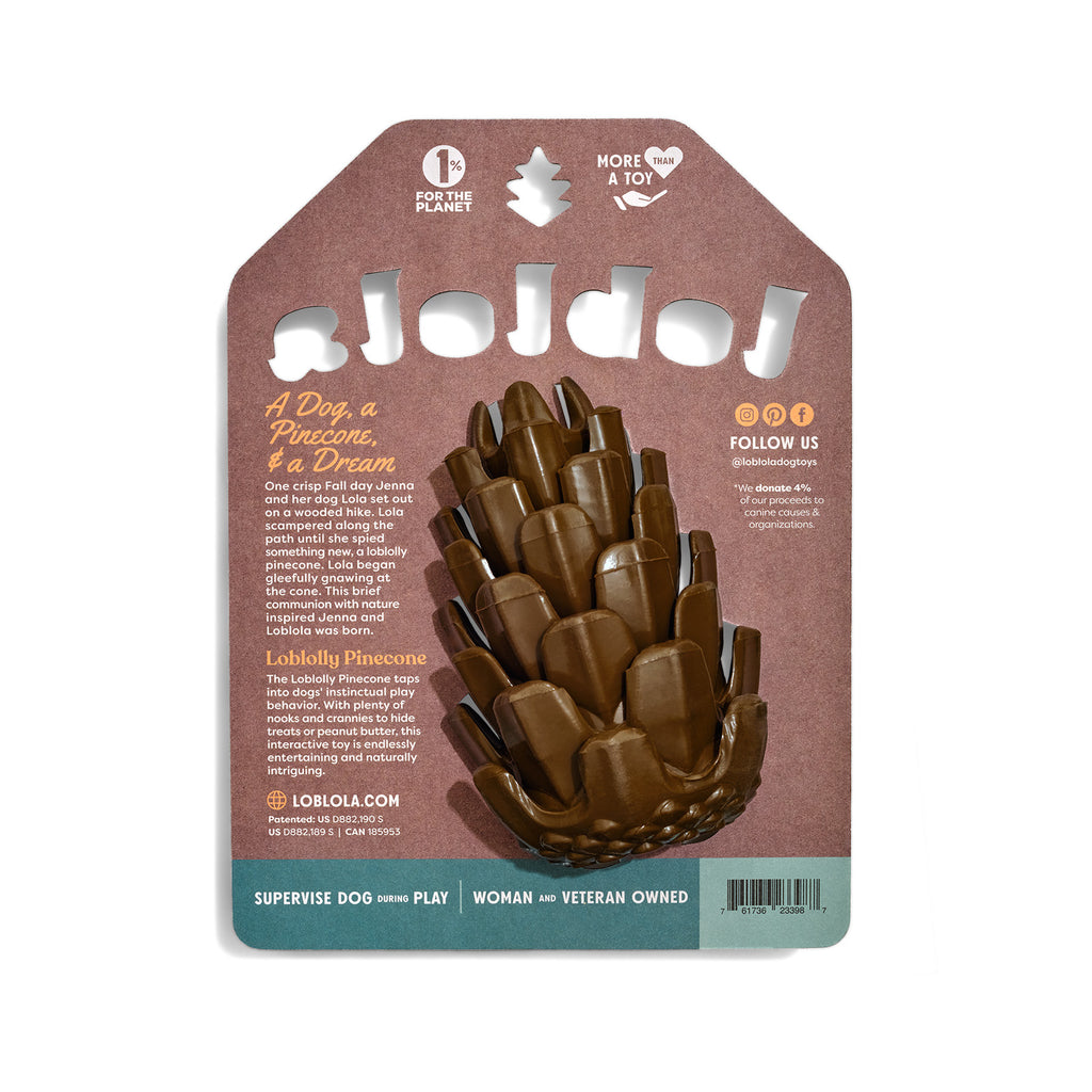 The Loblolly Pinecone Puzzle Dog Toy by Loblola in its packaging. The back of the packaging is shown with text that explains Loblola's origin and the Pinecone toy itself.