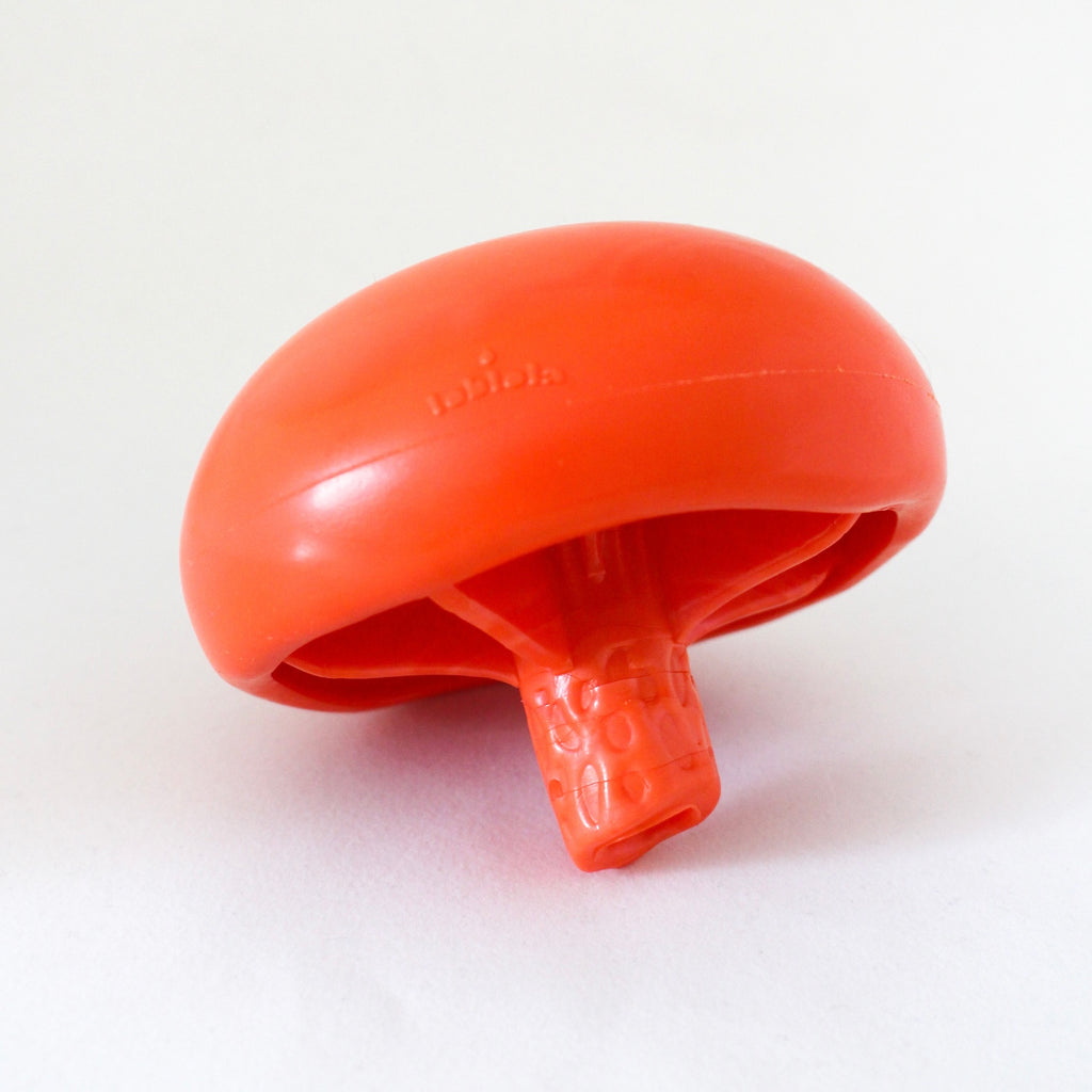 Milkcap Mushroom interactive dog toy in cherry tomato red